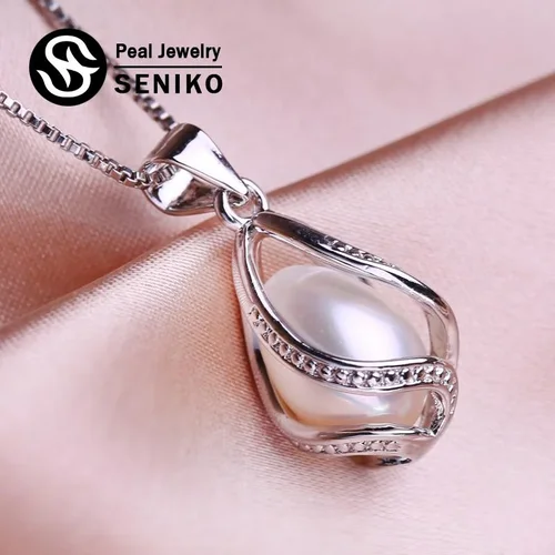 Seniko Freshwater Pearl Necklace with Geometric Cage Pendant